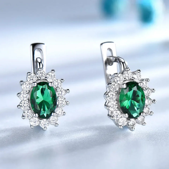 RadiantEmerald™ – 5*7mm Oval Clip Earrings with Emerald and Flower Design
